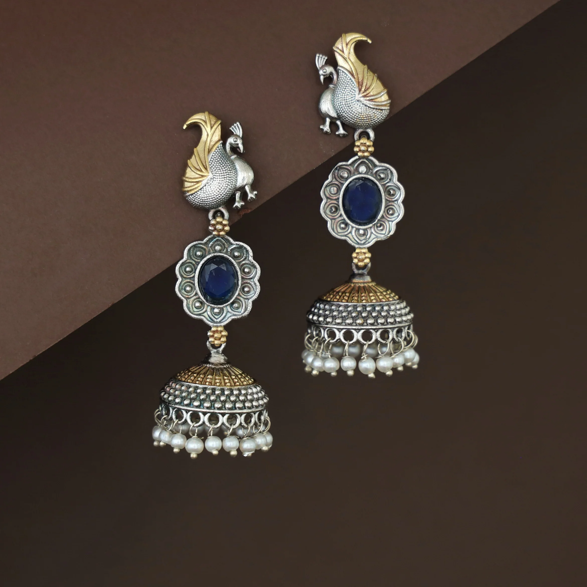 Deesha Mayura Dual Tone Oval Glossy Jhumka - Image 4