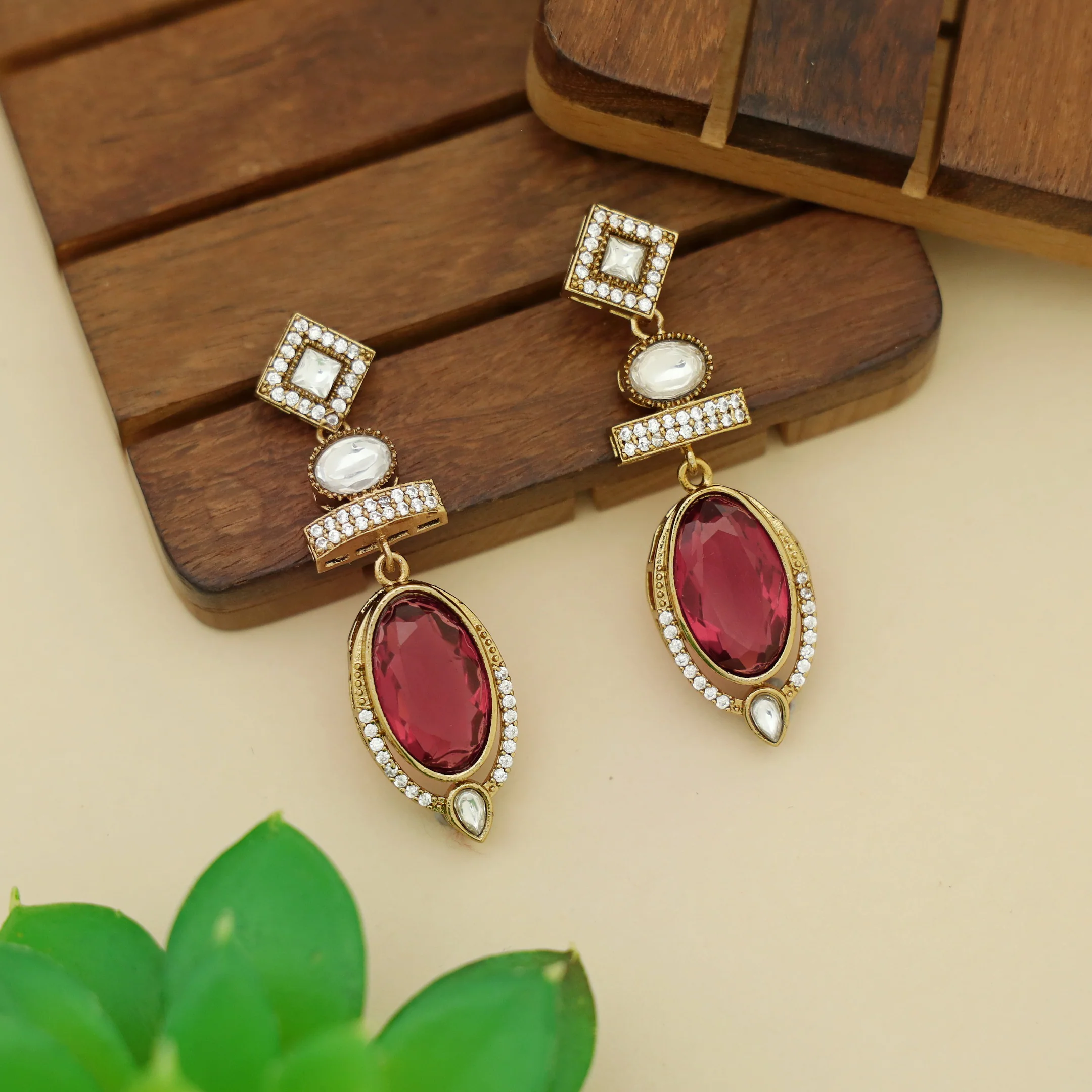 Dipti AD Stone Oval Glossy Stone Earring - Image 4