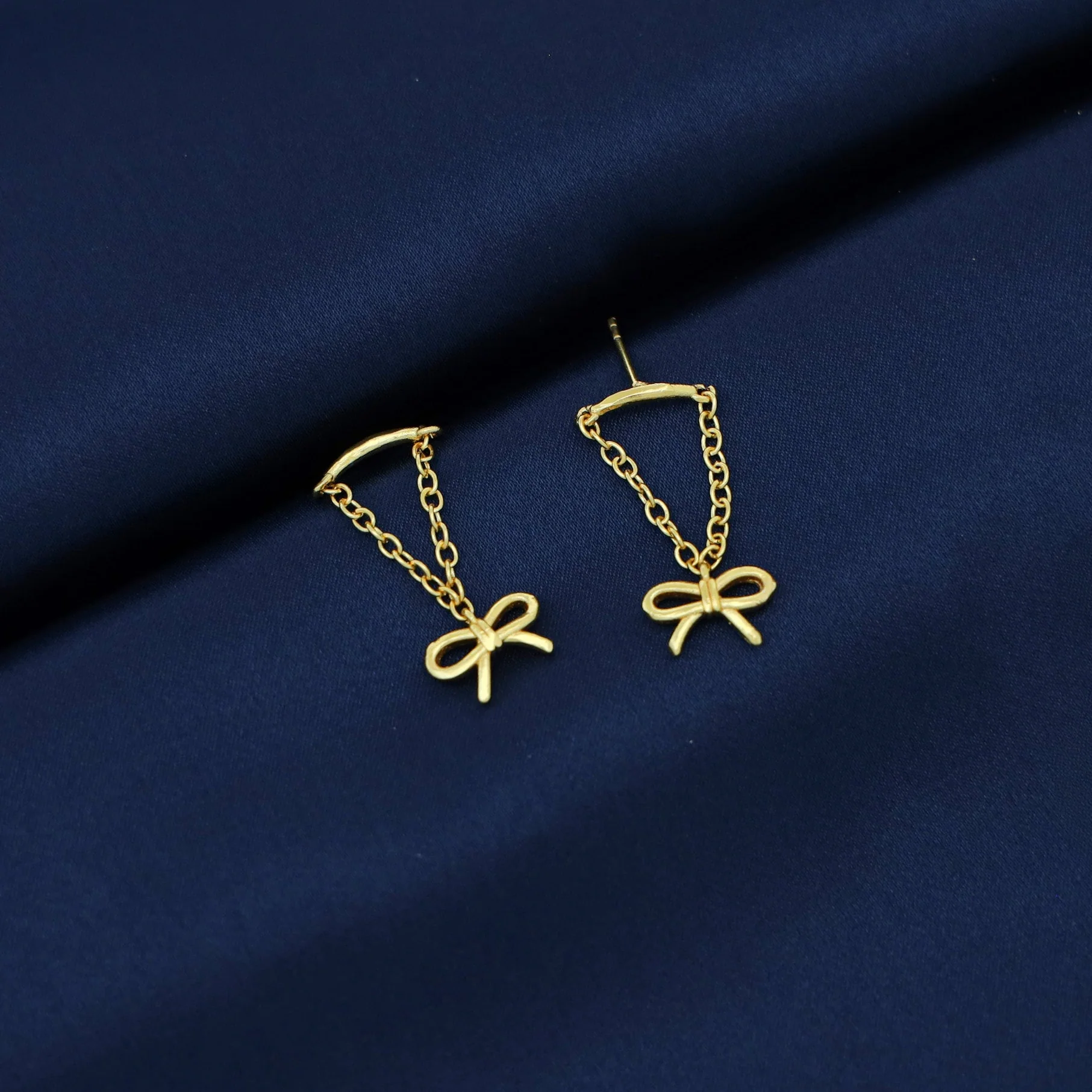 Emire Golden Chainy Hanging Ribbon Earring - Image 2