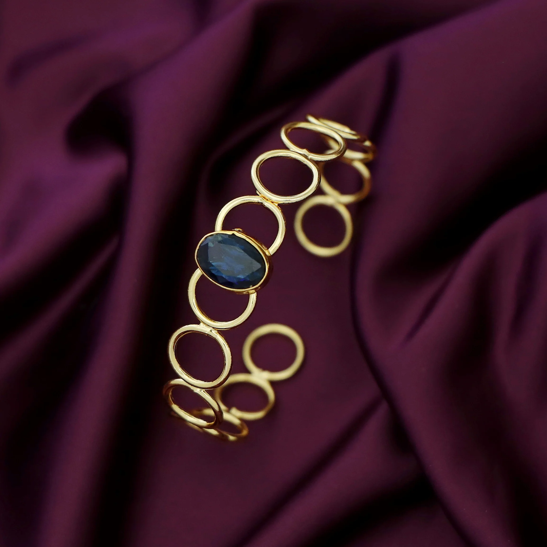 Doyel Golden Circle Oval Glossy Stone Bangle - Image 10