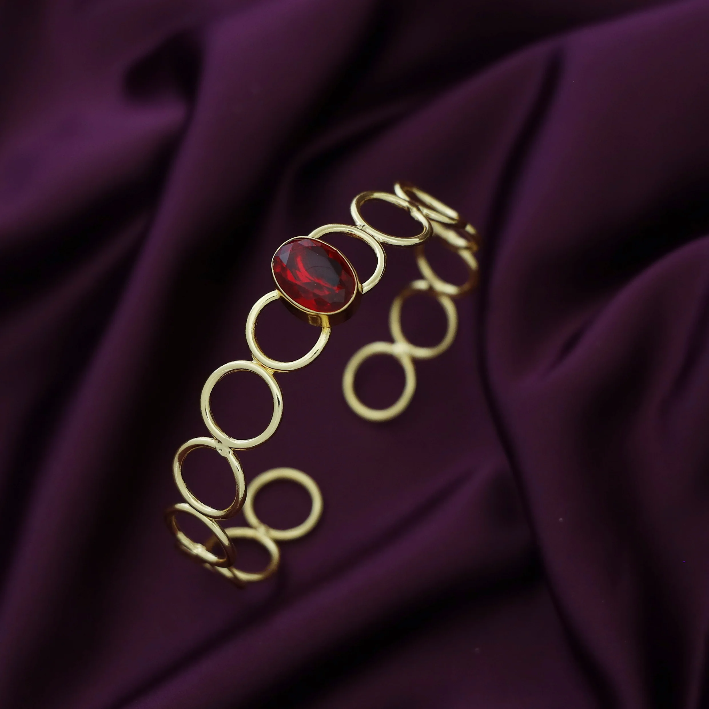 Doyel Golden Circle Oval Glossy Stone Bangle - Image 2
