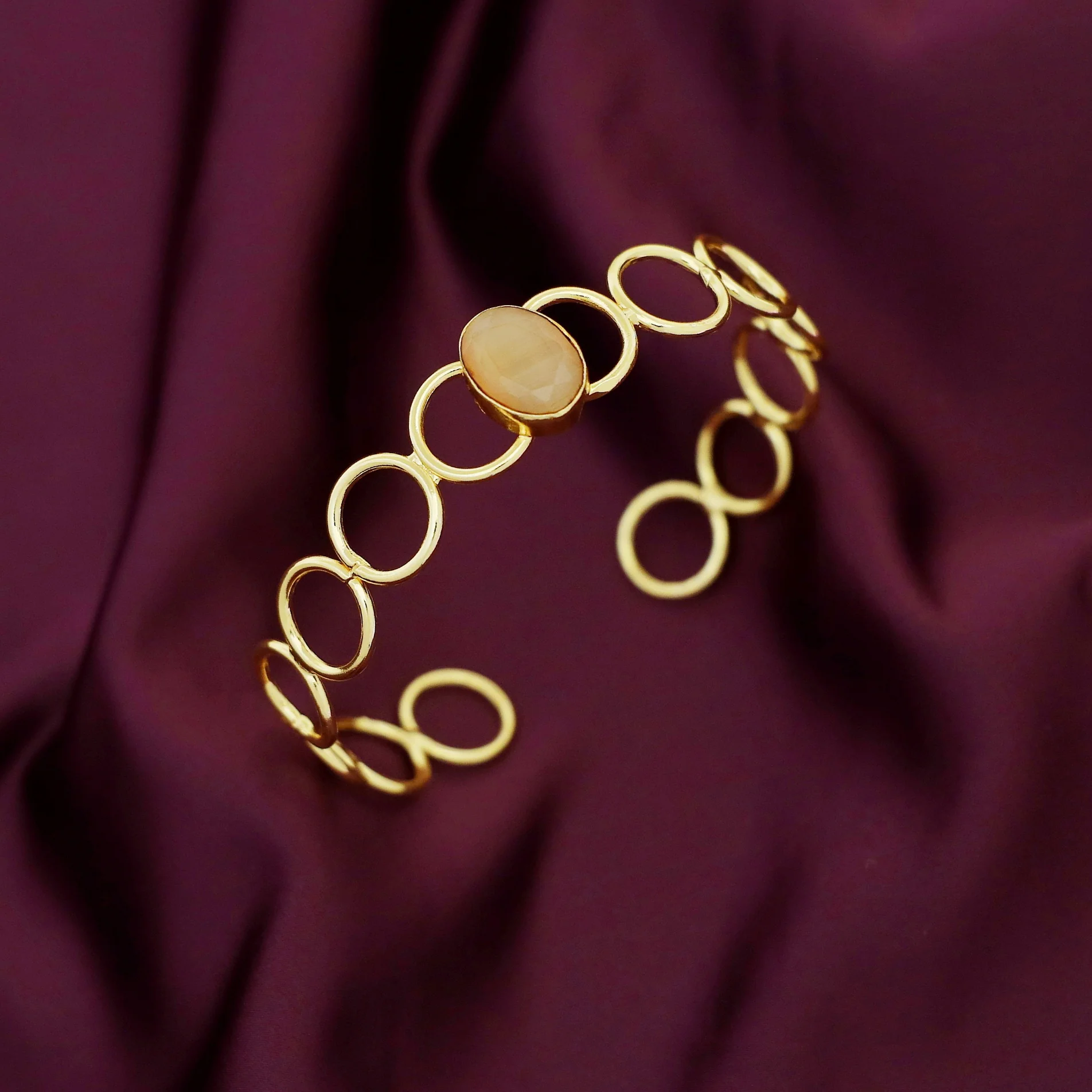 Doyel Golden Circle Oval Glossy Stone Bangle - Image 6
