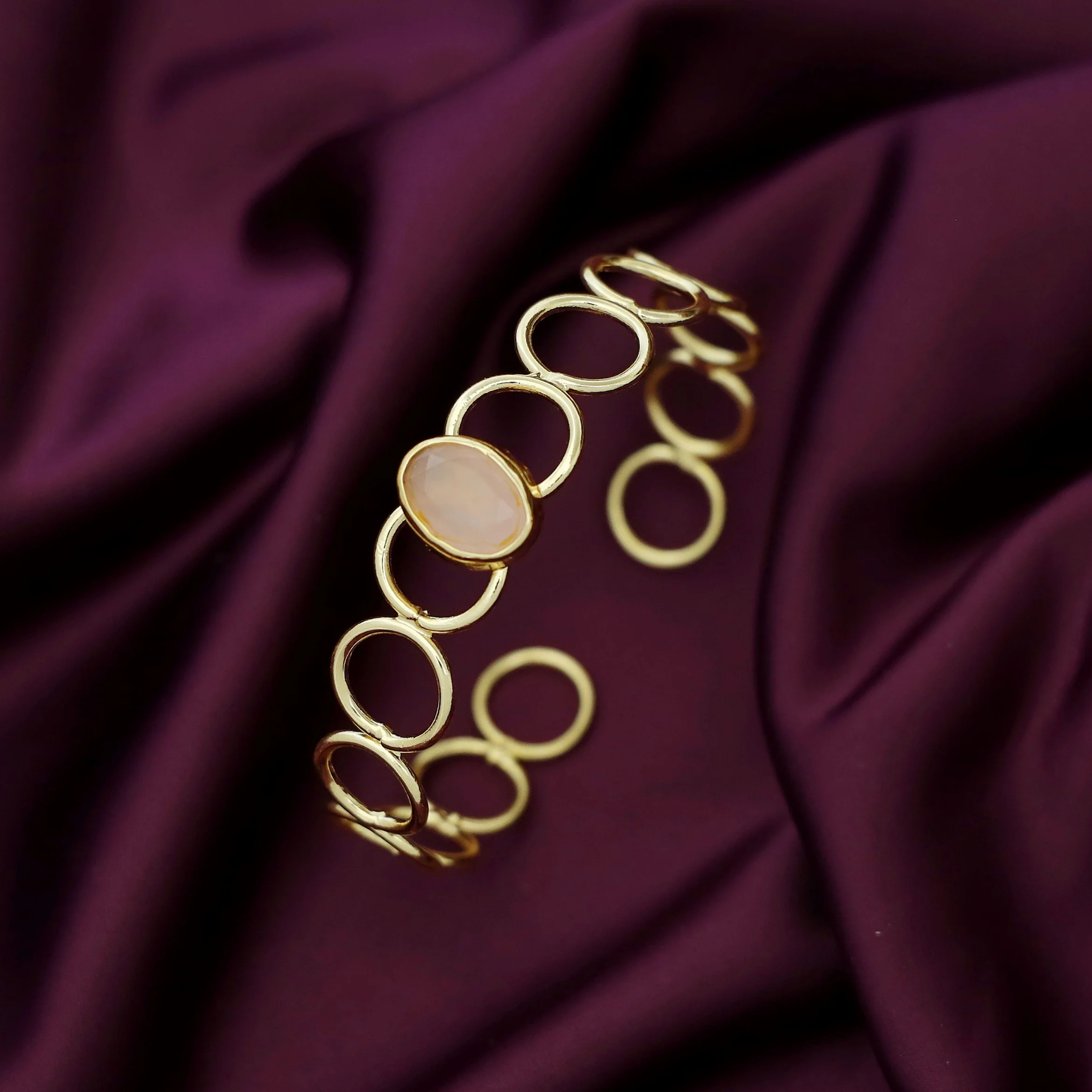 Doyel Golden Circle Oval Glossy Stone Bangle - Image 9