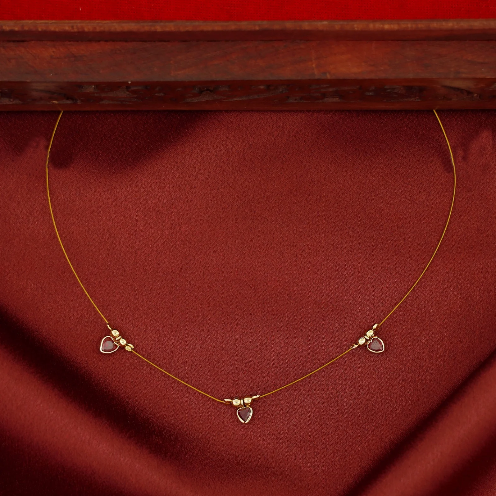 Tejaswini Golden Tri Heart String Neckpiece - Image 2
