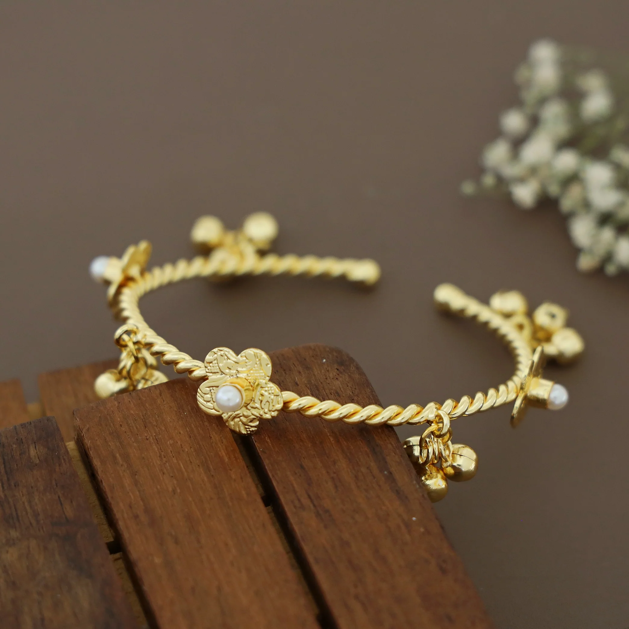Golden Twisted Ghungroo Floral Pearl Glossy Bangle - Image 6