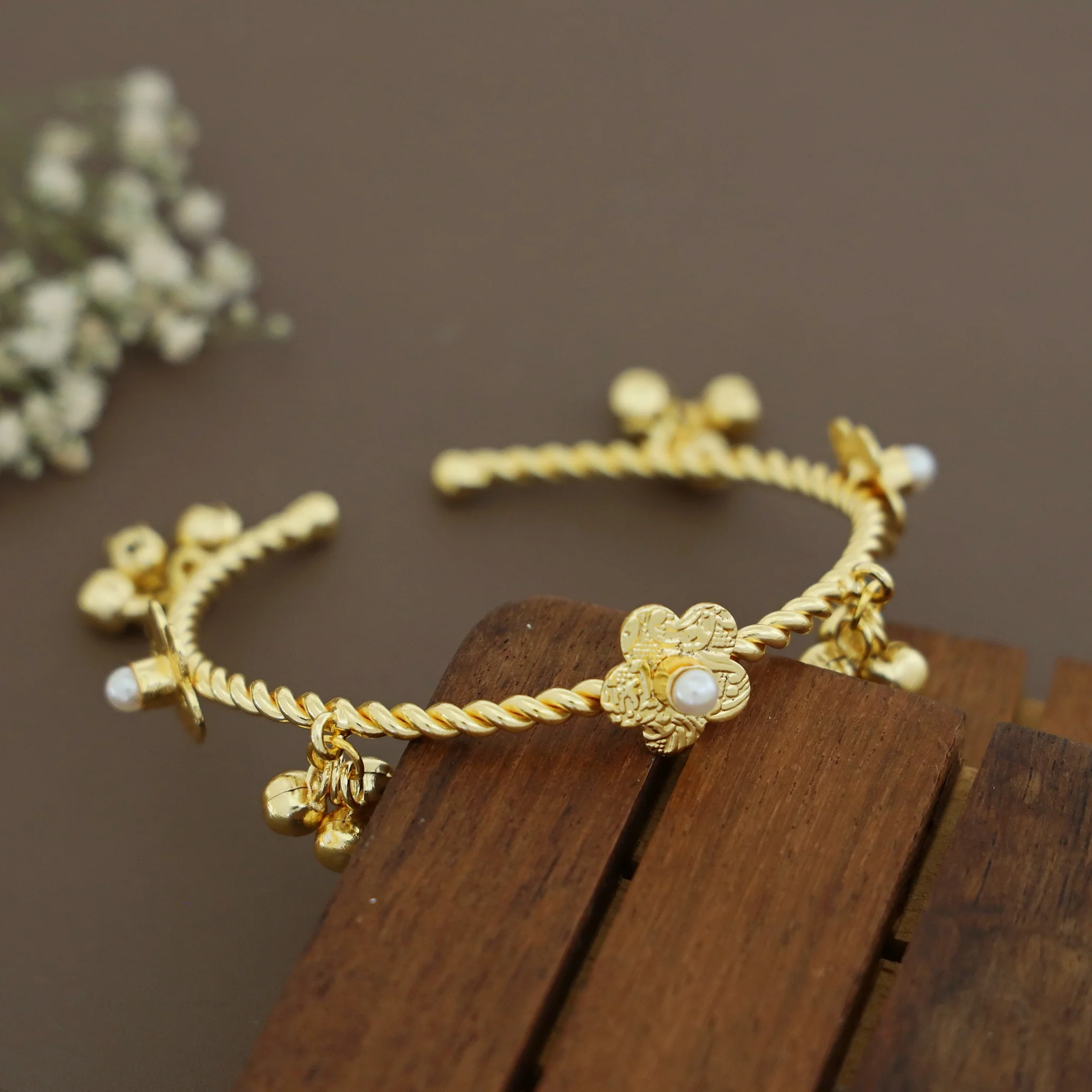 Golden Twisted Ghungroo Floral Pearl Glossy Bangle - Image 7