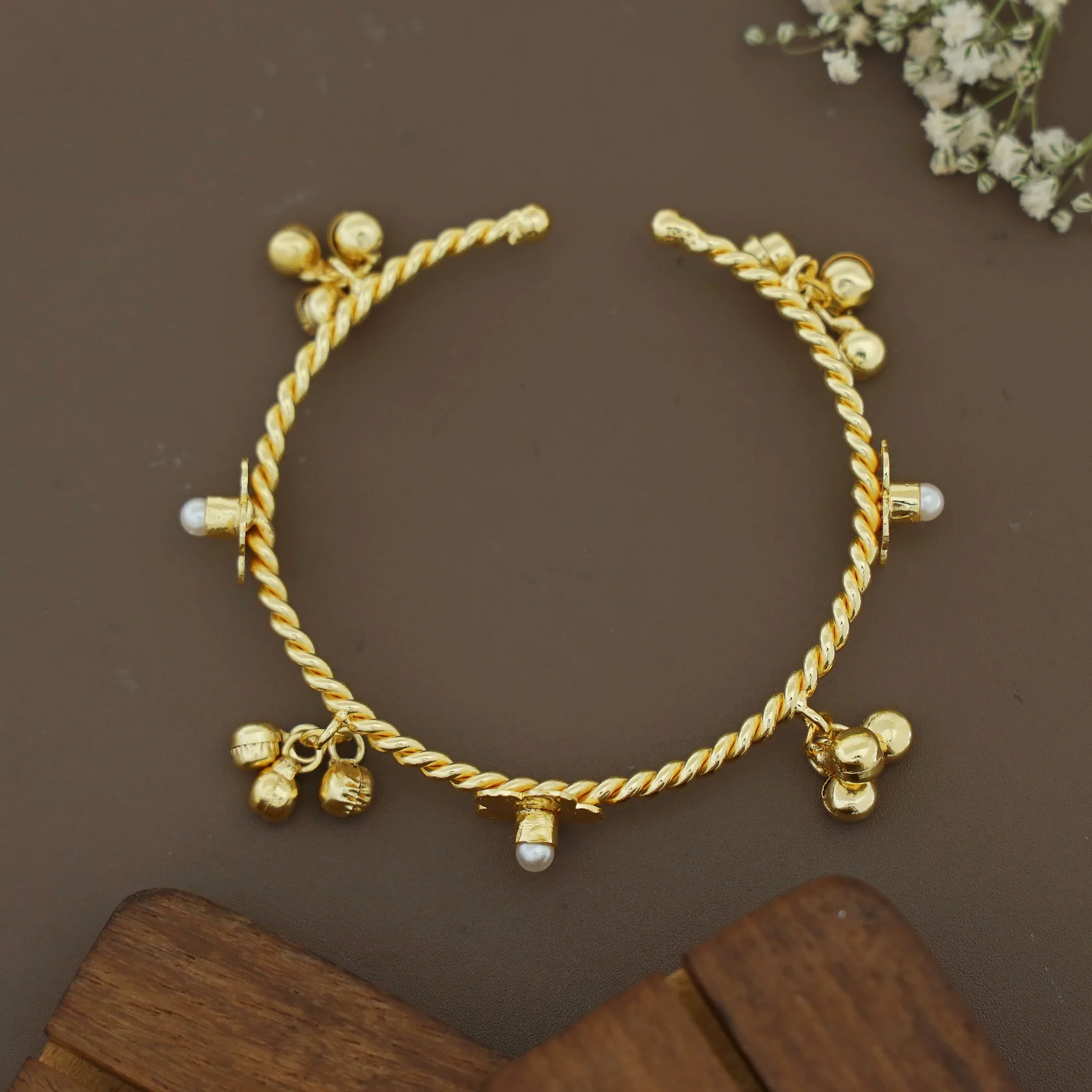 Golden Twisted Ghungroo Floral Pearl Glossy Bangle - Image 8