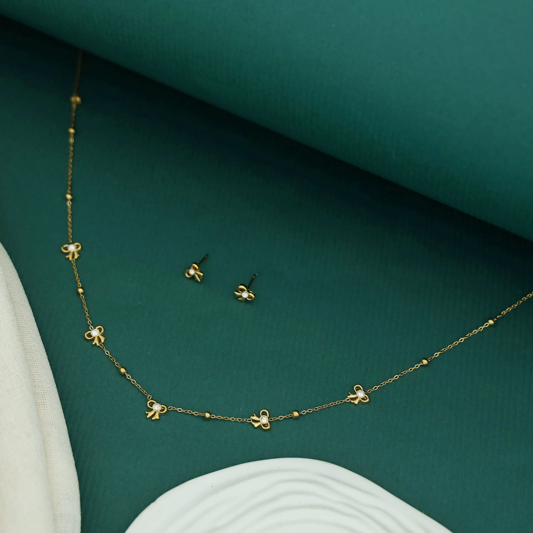 Janelle Golden Ball Glossy Bow Neckpiece With Stud - Image 2
