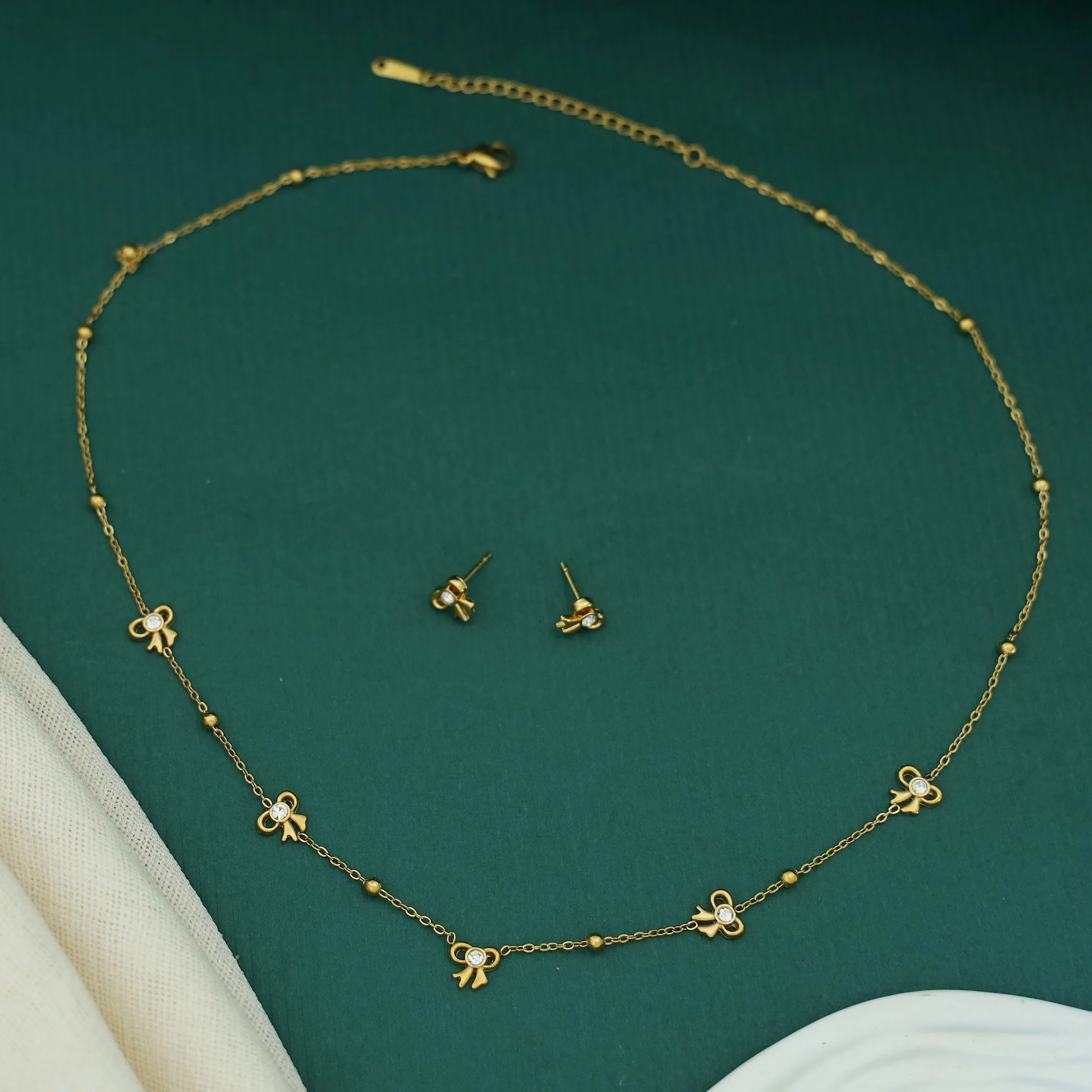 Janelle Golden Ball Glossy Bow Neckpiece With Stud - Image 3