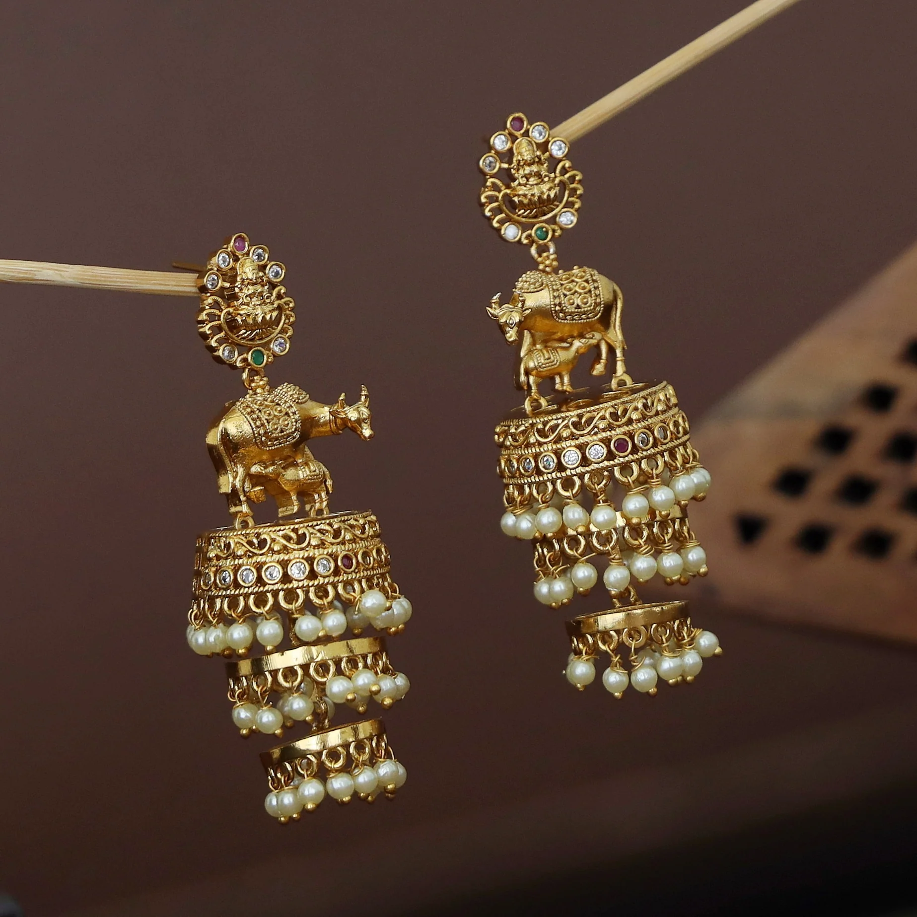 Lekshmi Feeding Calf Design Three Layer Pearl Jhumka - Image 4
