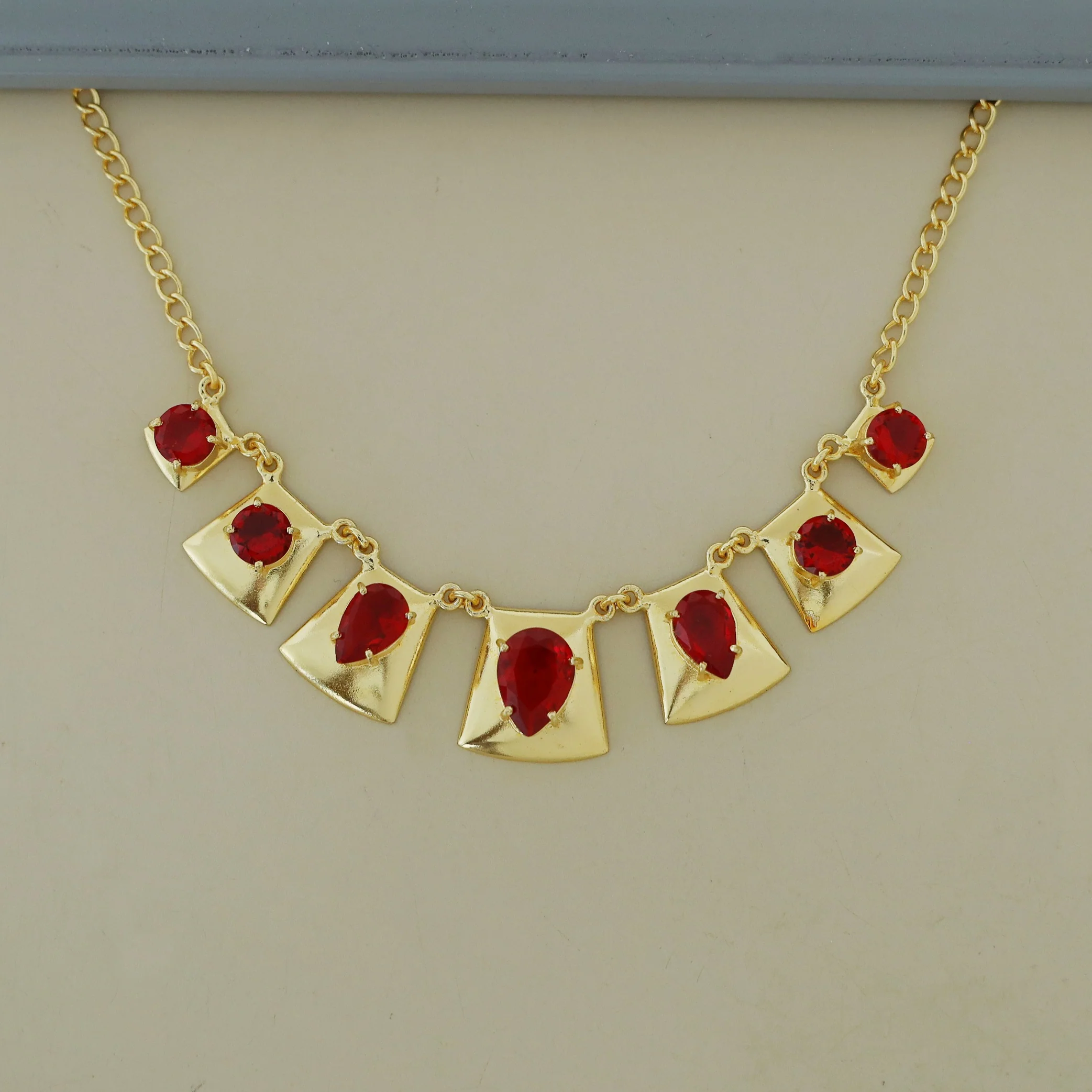 Madrigal Golden Glossy Neckpiece - Image 3