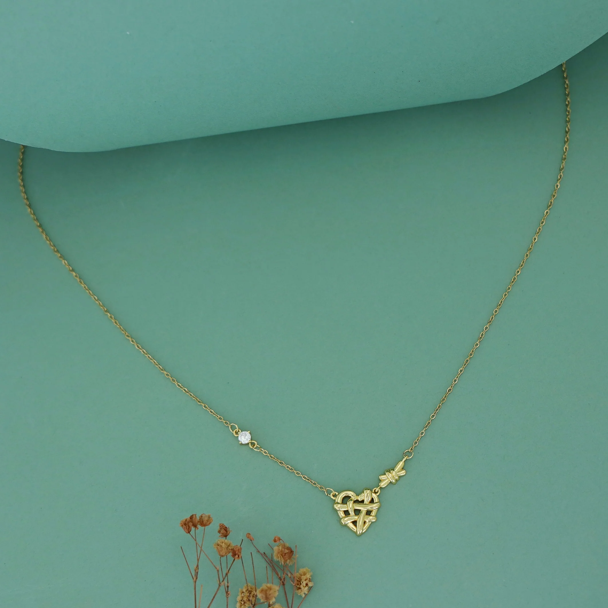 Raya Golden Heart Knot Neckpiece - Image 2