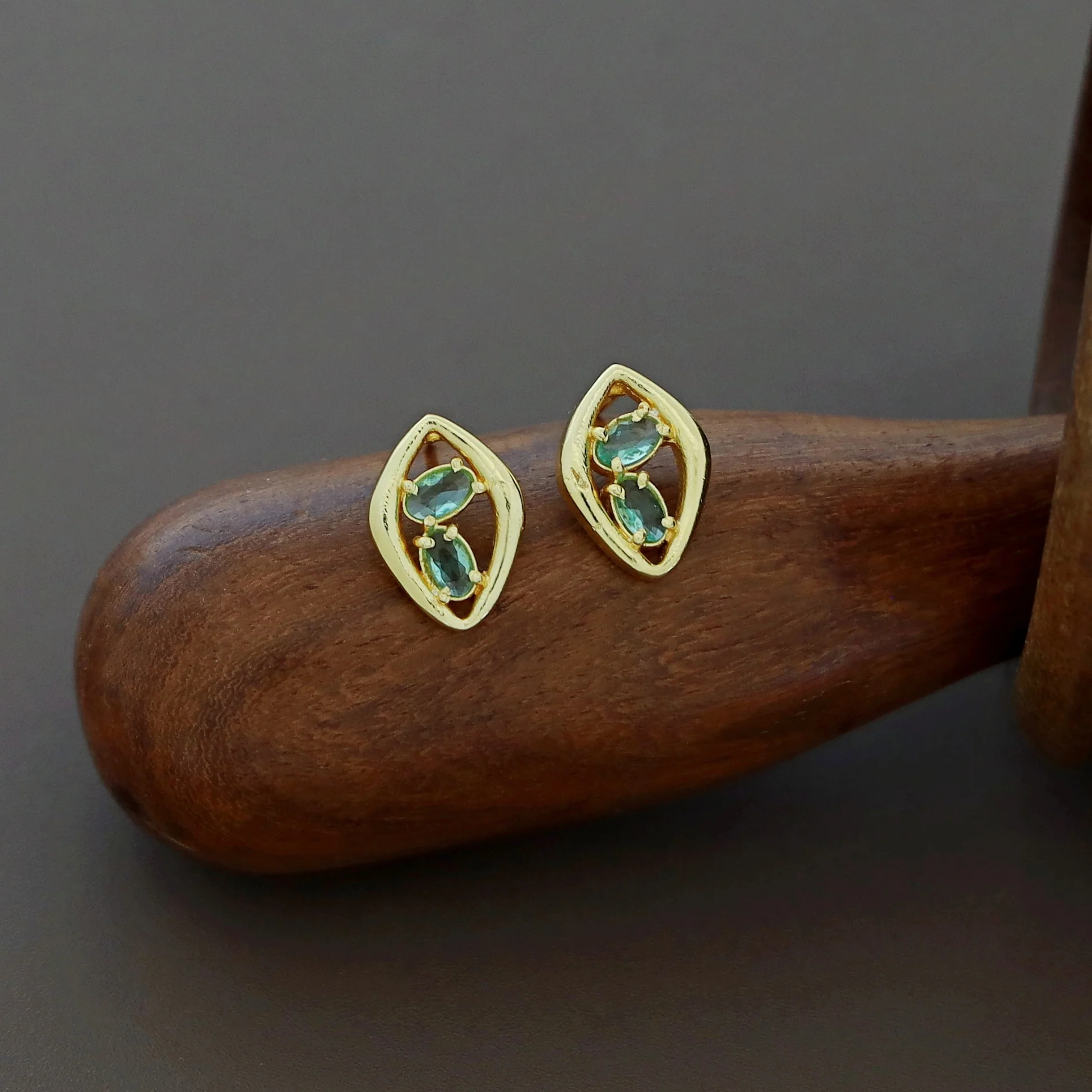 Supriya Golden Dual Glossy Eye Shaped Earring - Image 7